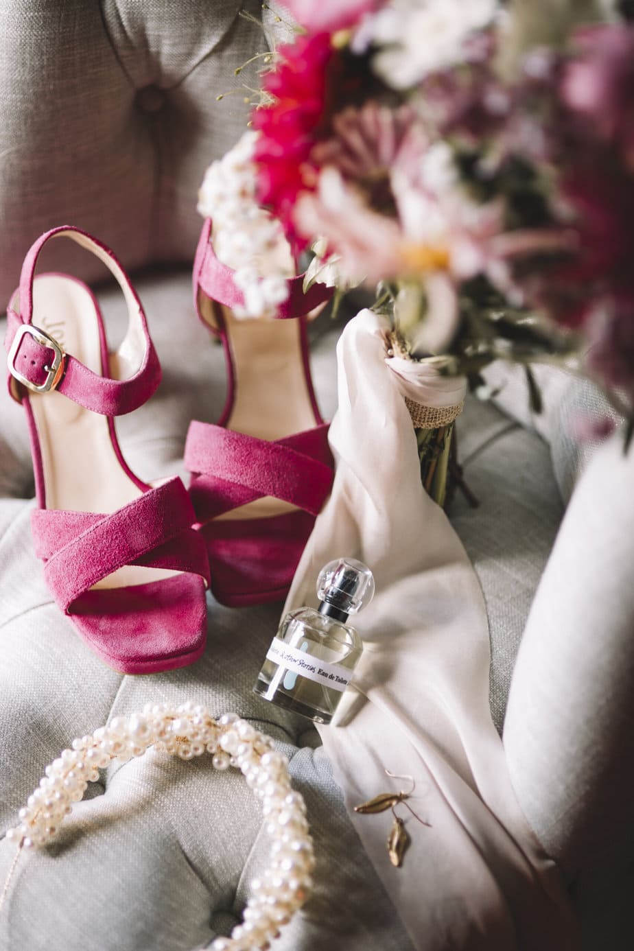 kates details for her grange farm wedding, including pink shoes a peal headband and perfume