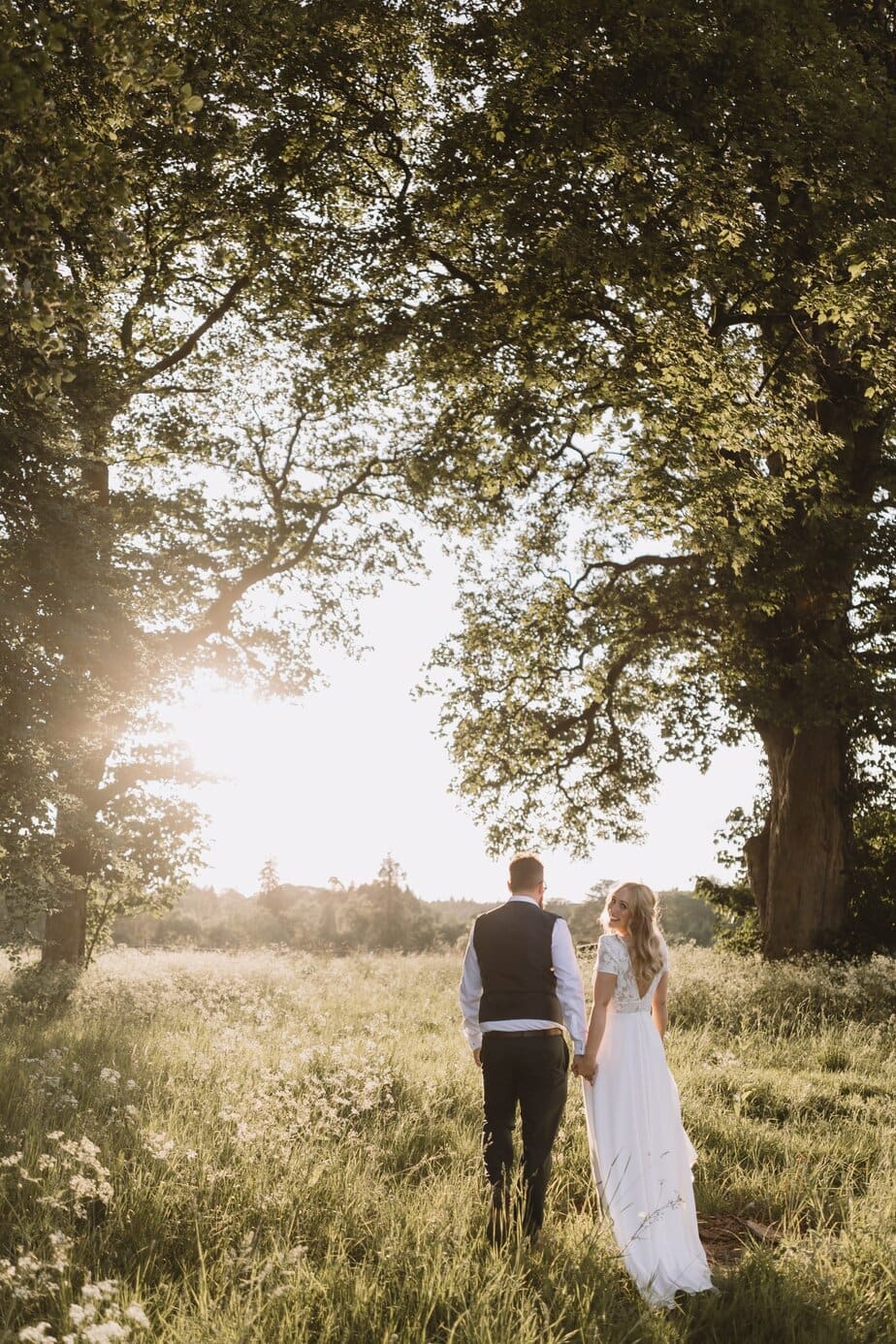 Couple embracing during wedding portraits at five four studios in Manchester.
